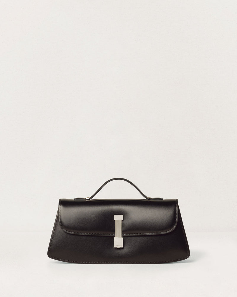 Kassandre Colonne clutch in black cow leather with silver hardware, rigorous lines, front view