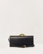 Kassandre Deva clutch in black cow leather with gold hardware, Art Deco geometry,removable strap , crossbody bag , front view