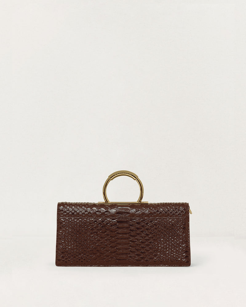 Kassandre Deva clutch in brown python-effect leather, sculptural Art Deco geometry, removable strap , crossbody bag ,back view