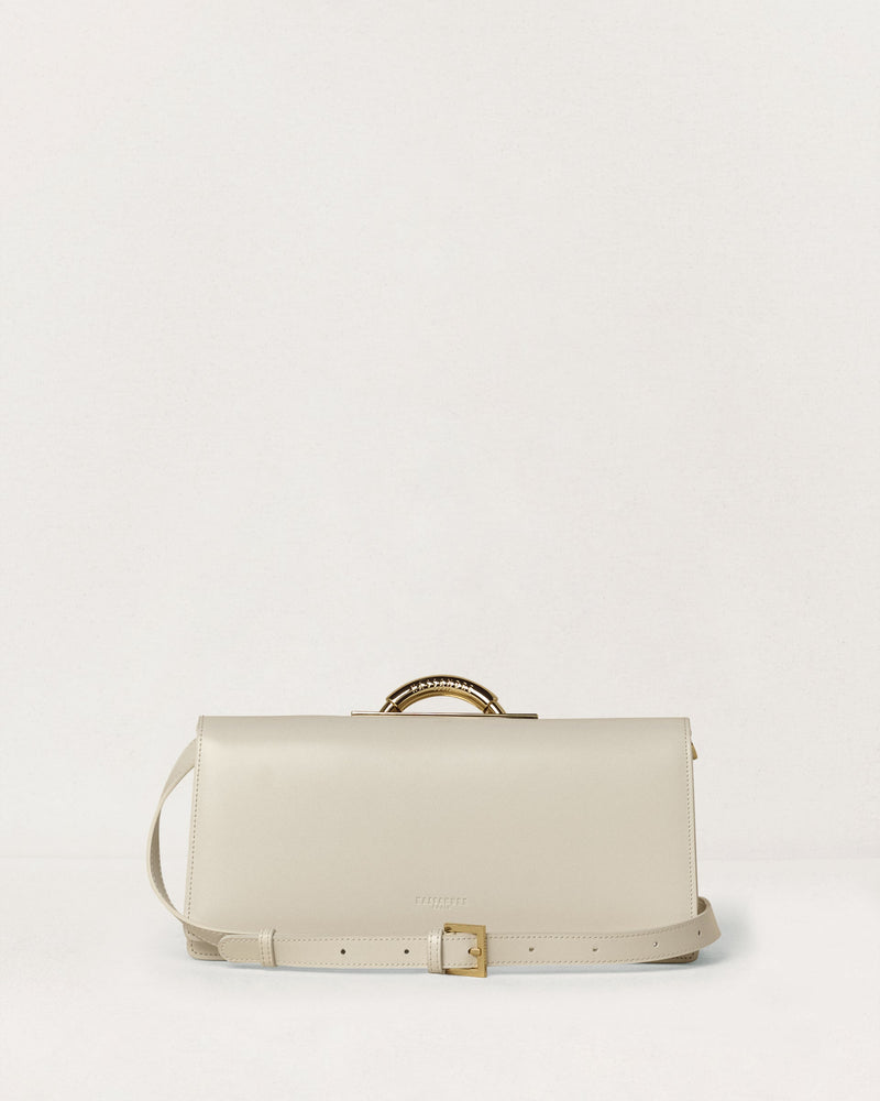 Kassandre Deva clutch in off-white cow leather, pure geometric form, adjustable strap, removable strap , crossbody bag ,back view