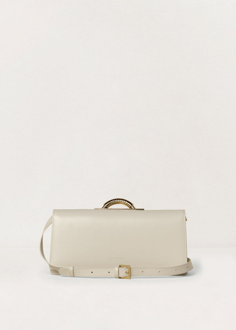 Kassandre Deva clutch in off-white cow leather, pure geometric form, adjustable strap, removable strap , crossbody bag ,back view