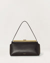 Kassandre Eileen shoulder bag in black smooth cow leather with striped metal frame, front view