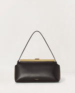 Kassandre Eileen shoulder bag in black smooth cow leather with striped metal frame, front view