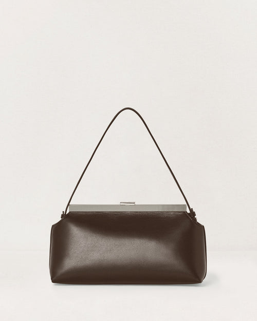 Kassandre Eileen shoulder bag in brown smooth cow leather with striped metal frame, back view