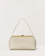Kassandre Eileen shoulder bag in off-white cow leather with gold striped metal frame, back view